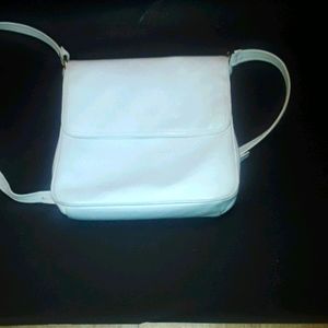 A white crossbody bag